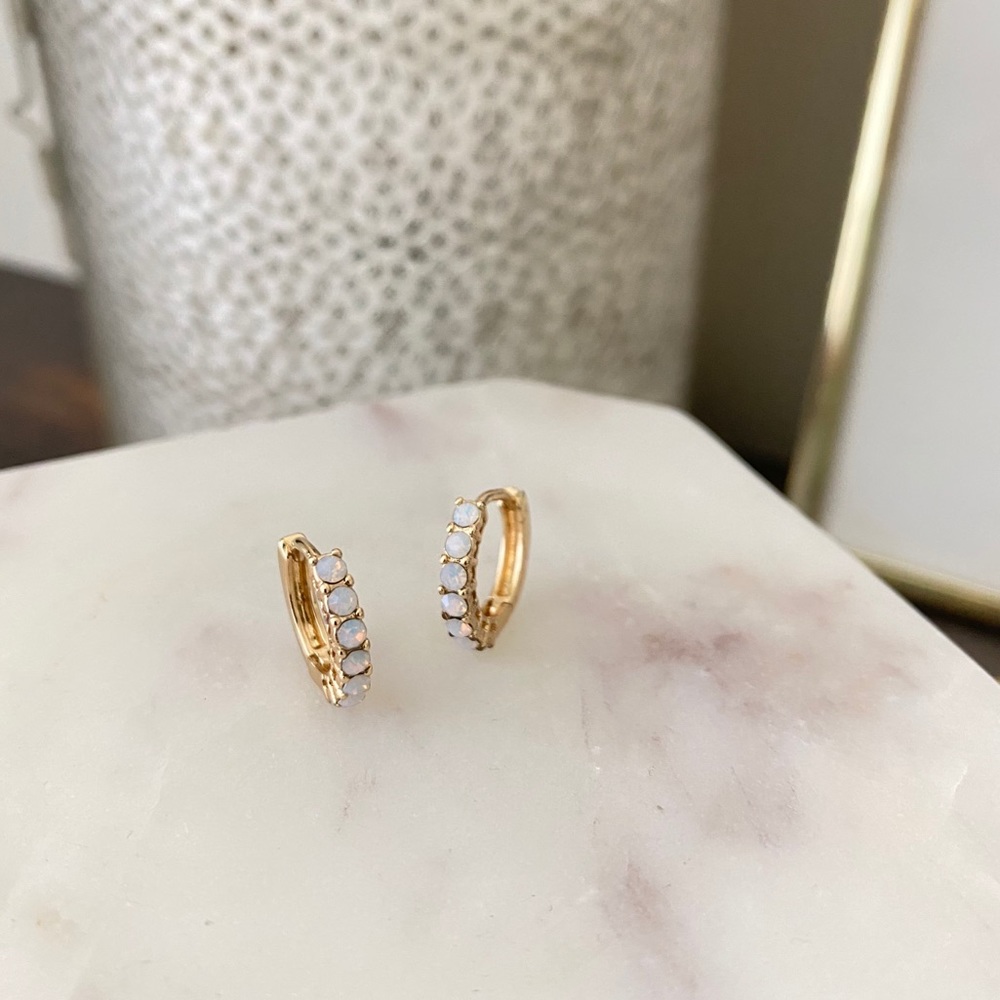 Small gold earrings with rhinestones